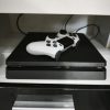 Prodajem Sony PS4 sa 6 igrica